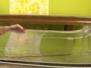 Busty pee fetish babe plays with her pee 2/16