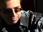 Gauge in sheer black stockings and a garter