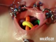 Extremely bizarre pierced vaginal insertions 1/16