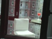 Natural blonde masturbating on the balcony 2/16