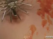 Dominatrix covers her naked slave girl in wax 5/16