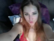 Babe in red lingerie acting naughty 10/16