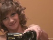 Tiny hottie masturbating with a vibrator 1/16