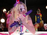 Clown Leya Falcon plays with a big purple dildo 3/16