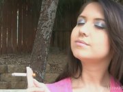 Holding a cigarette and teasing her friend 15/16