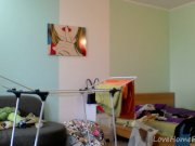 Naked MILF taking care of her laundry 1/16