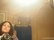 Brunette gets naked and masturbates in the bathroom 2/16