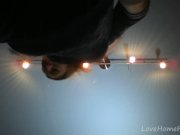 Redhead in a red dress rubs her pussy 2/16