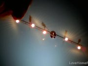 Redhead in a red dress rubs her pussy 7/16