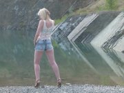 Hot blonde with big tits enjoys the lake 5/16