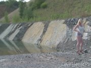 Hot blonde with big tits enjoys the lake 7/16