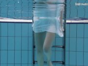 Redhead beauty in the white dress 1/16