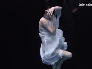 Redhead beauty in the white dress 3/16