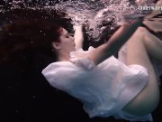 Redhead beauty in the white dress 7/16