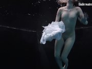 Redhead beauty in the white dress 9/16