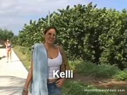 Handjob from busty brunette on beach 1/16