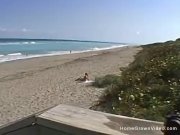 Handjob from busty brunette on beach 4/16