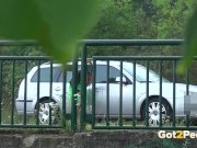 Pee Desperation - Redhead fires piss streams through a railing in public 5/16