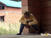 Blonde teen pisses on a building site to relieve pee desperation
