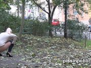 Desperate girls find a hideaway in a busy city to squat down and pee 1/16