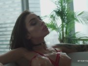 Busty russian babe Megan teasing from the bathtub 9/16