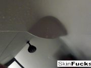 Sexy Skin plays with her anal toy in the shower 14/16