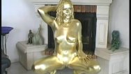 Painting naked girls - Busty girl body painted in gold