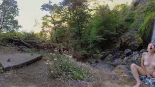 Watch hottie brunette Calliope masturbating at the waterfall